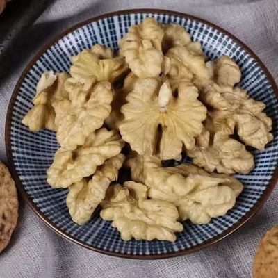 China Li Niu Niu Lebensmittelfabrik Großhandel Top Qualität Export Walnuss Beste Preis Roh Trockenfrüchte Wasch Walnüsse